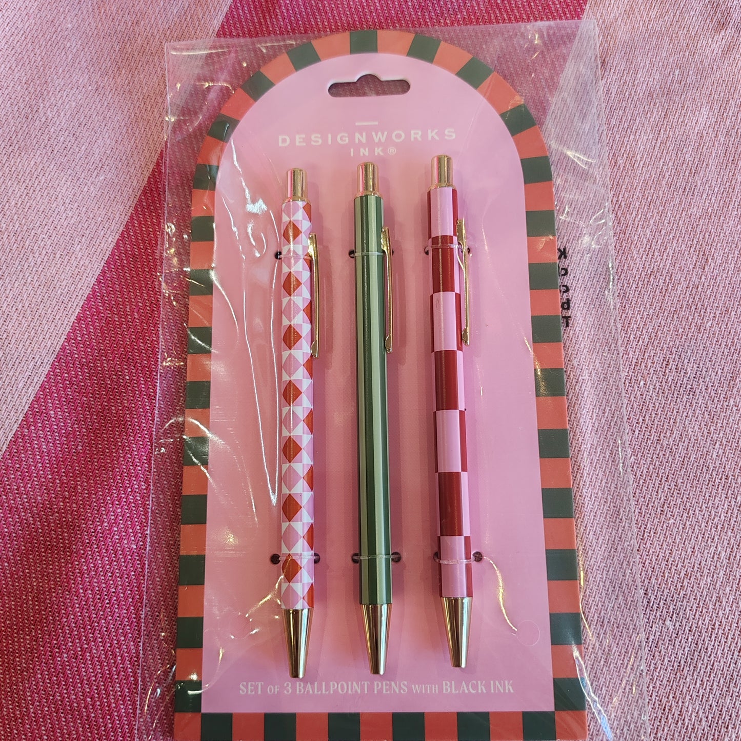 Set of 3 ballpoint pens. Stripe and check pinks and greens.