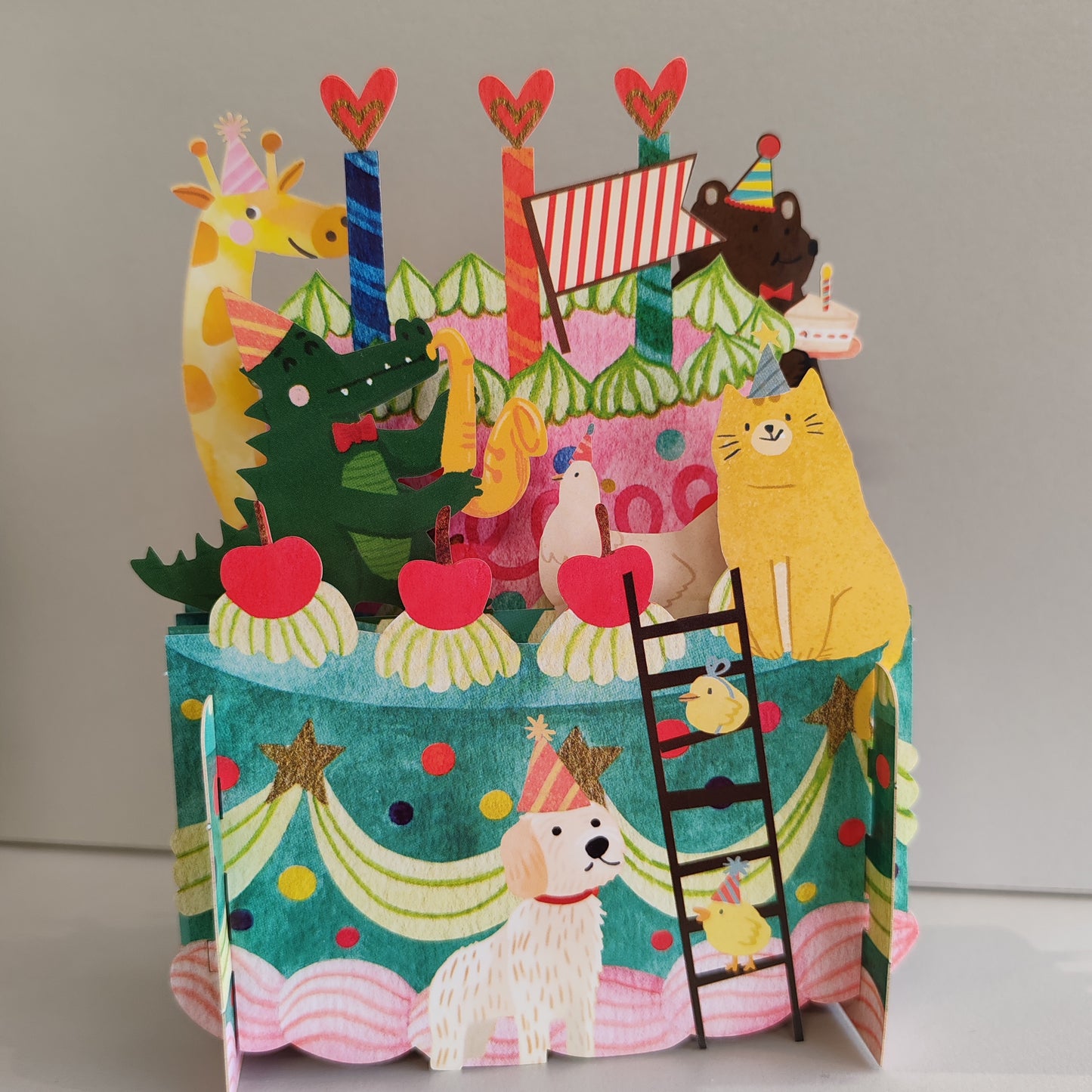 Miniature world 3d POP up greeting card. Animal birthday cake theme