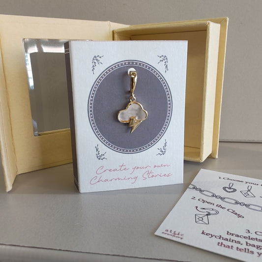 Mother of Pearl cloud lightning clip on charm.