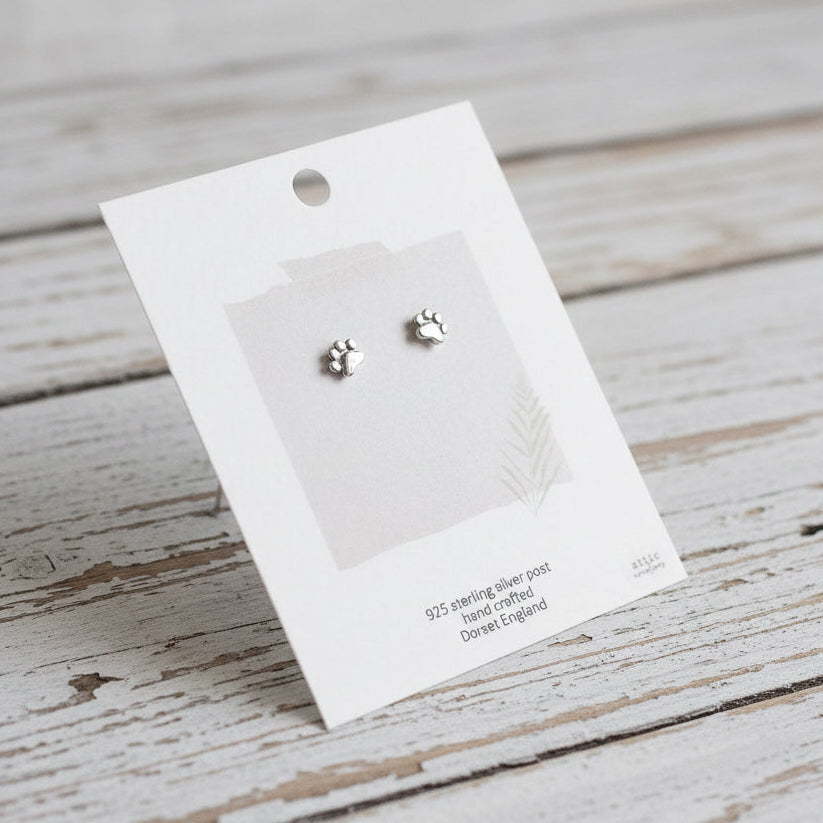 Silver paw earrings