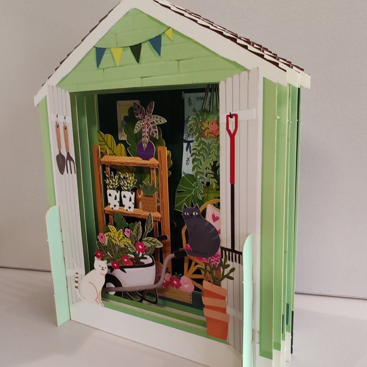 Miniature world Greeting card. Pop up Garden shed Theme