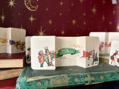 Vintage Christmas Cracker Card “The Carol Singers”