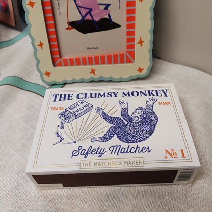 The clumsy monkey matches in decorative box.