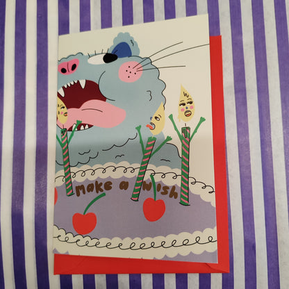 Make a wish cat blowing out candles greeting card
