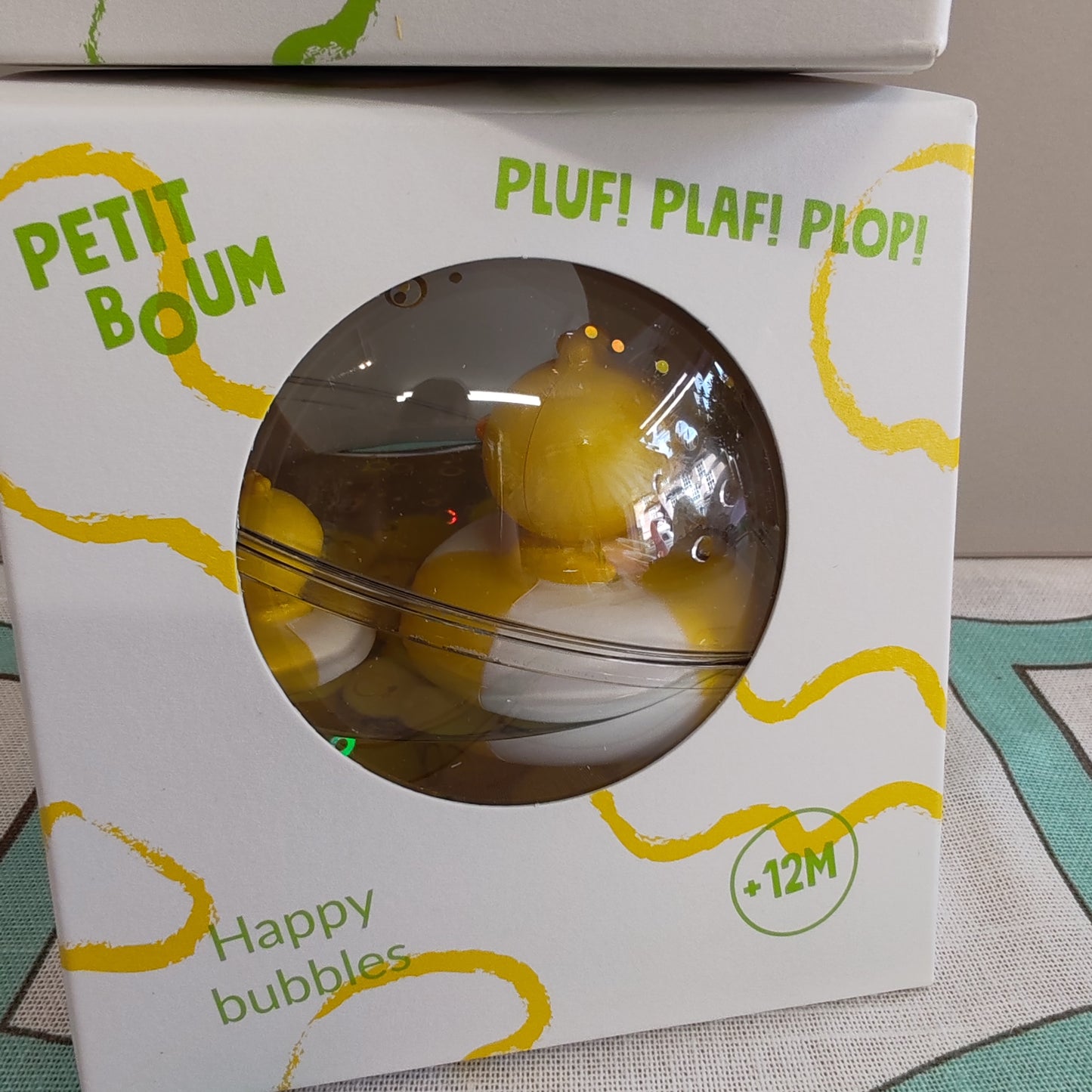 Sensory ball with ducks inside - yellow