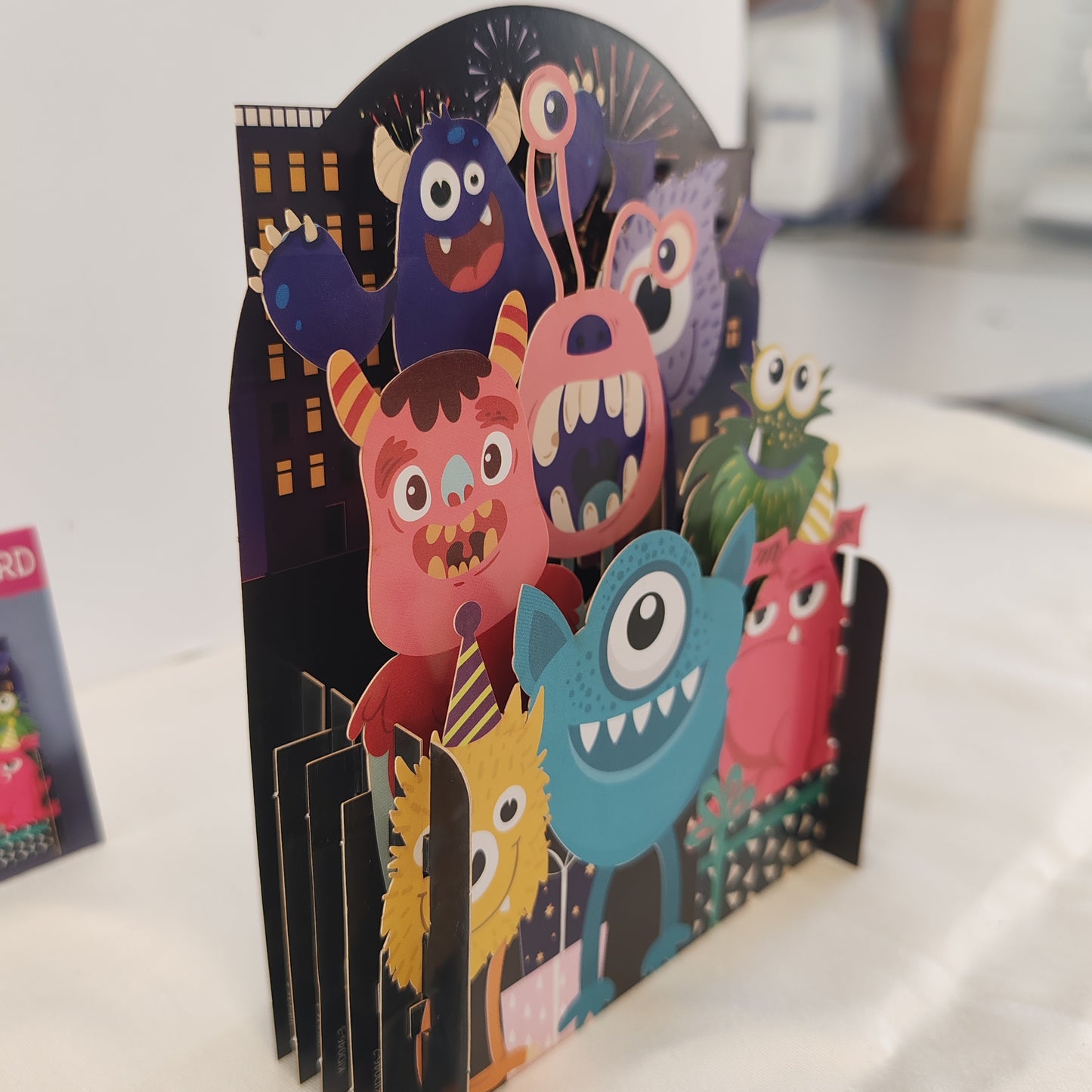 Miniature world 3d pop up greeting card. Monster theme.