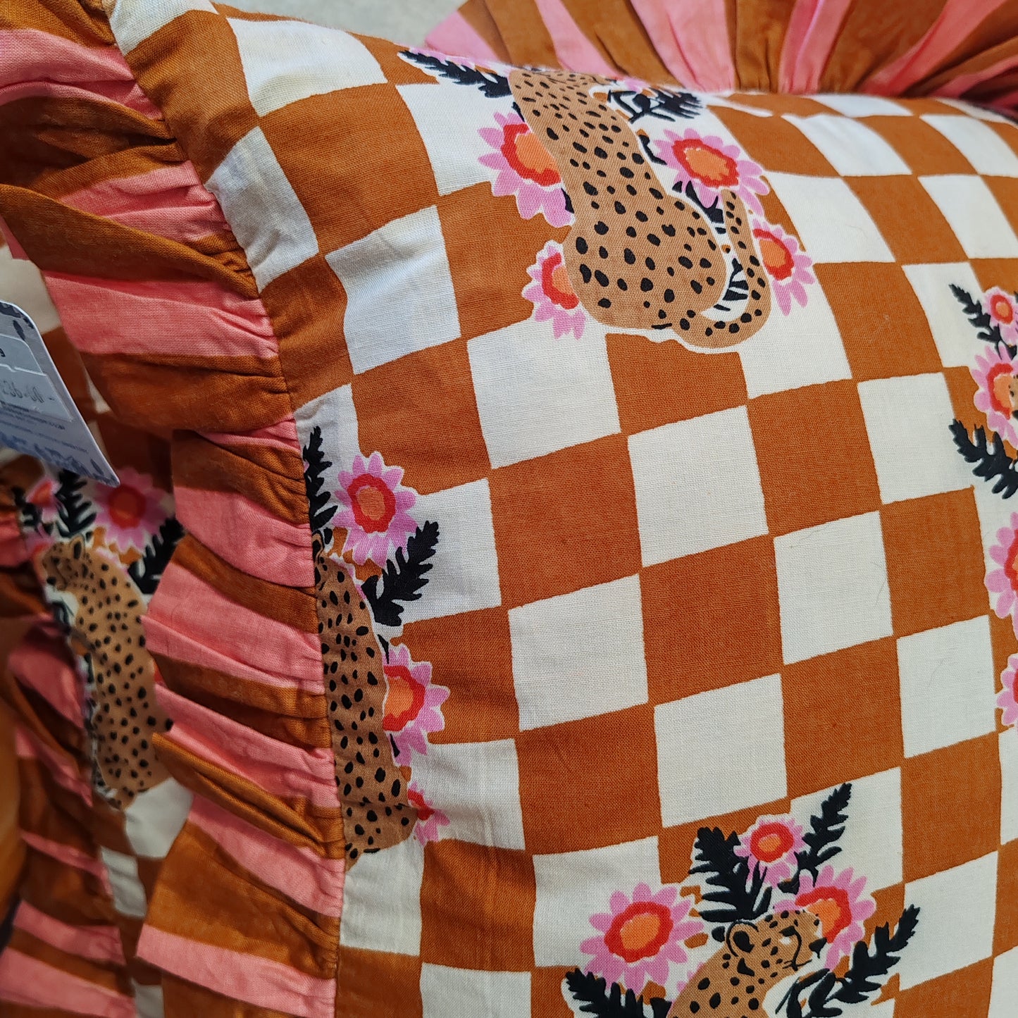 Leopard floral bronze / cream cushion with pink / bronze striped frill trim