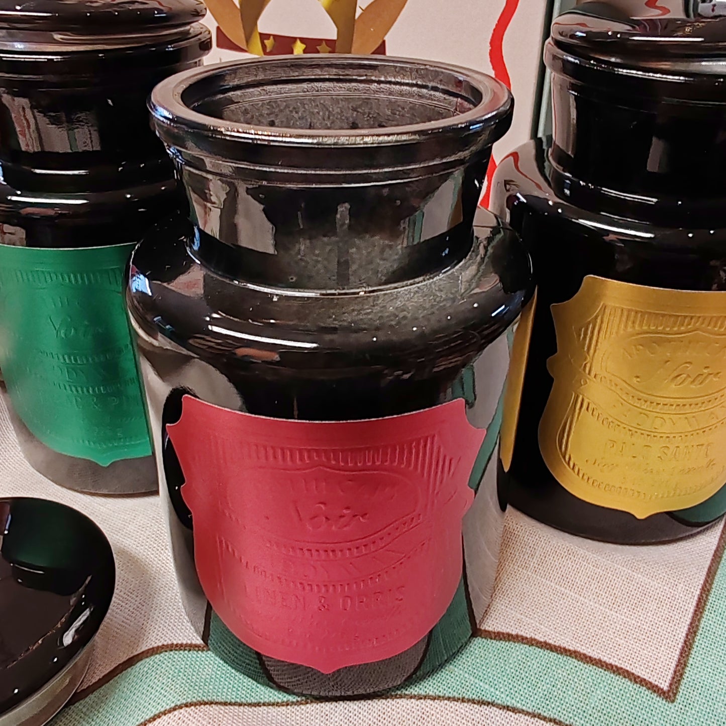 Black Apothecary Jar Rich rose label. Scent of Linen and Orris