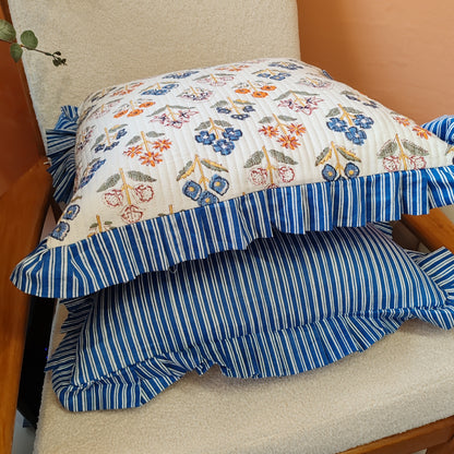 Large white / multi coloured floral cushion cover will a blue white striped frill