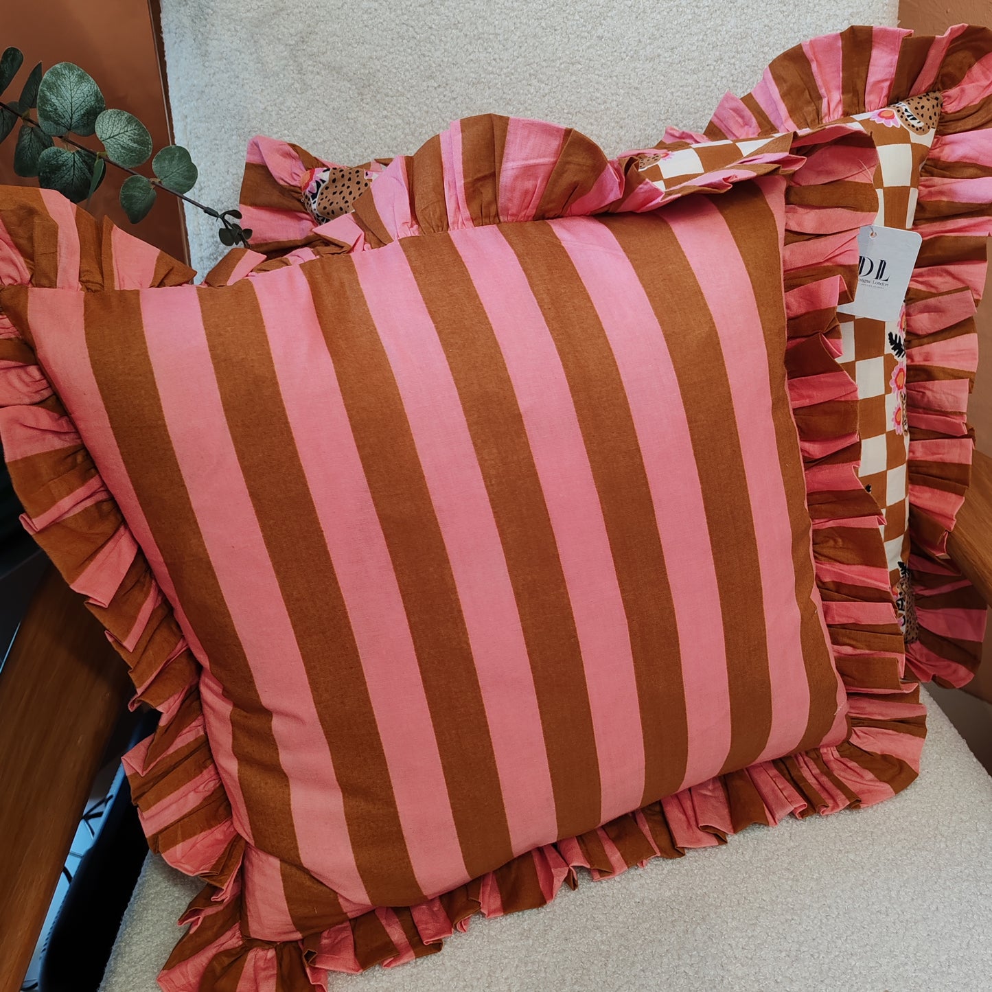 Leopard floral bronze / cream cushion with pink / bronze striped frill trim