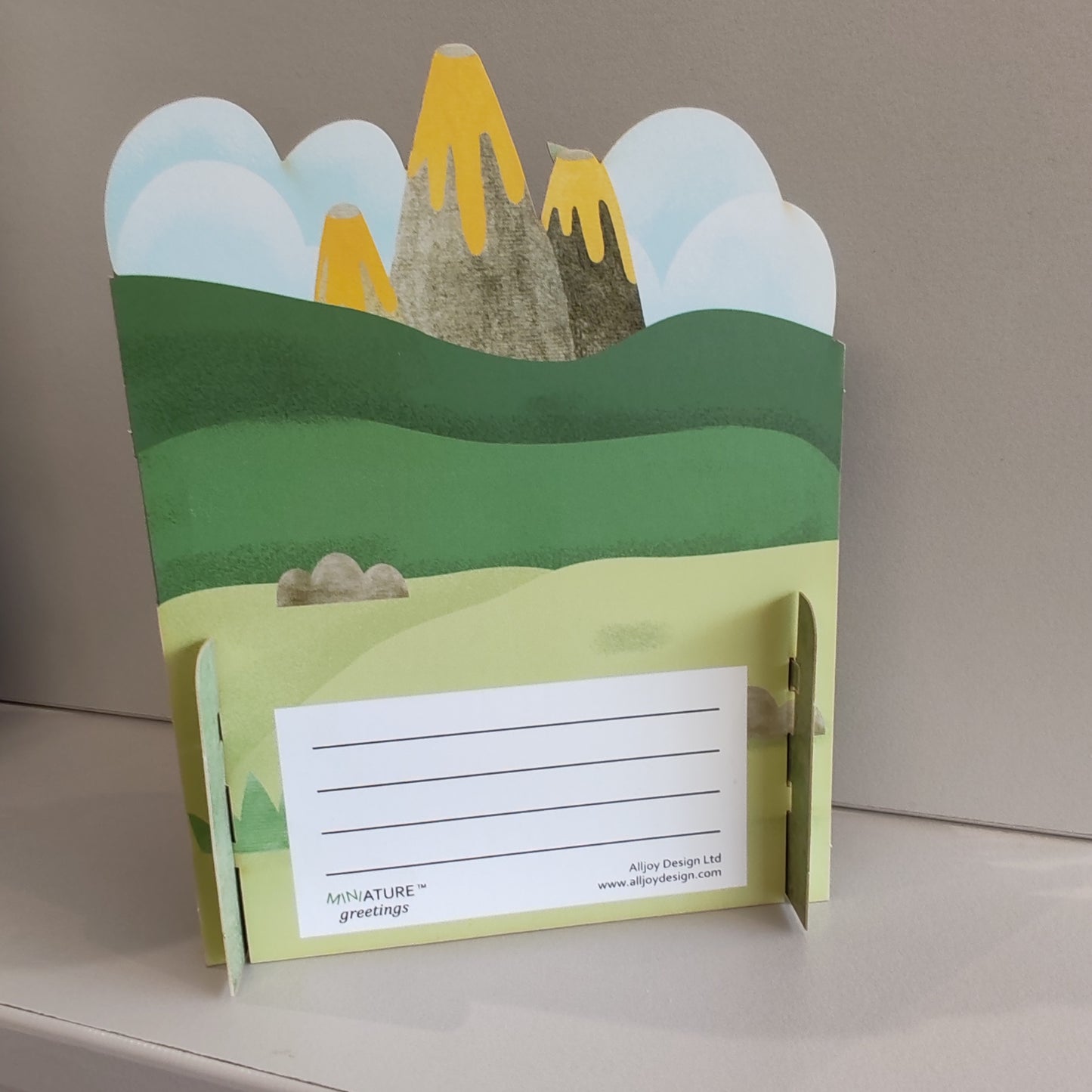 Miniature world 3D pop up greeting card. Dinosaur theme.