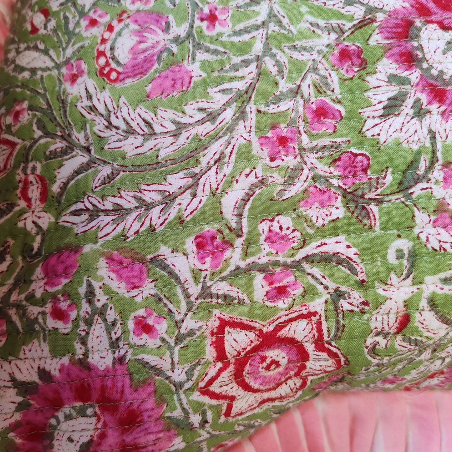 Large Pink / green floral quilted cushion with pink striped frill