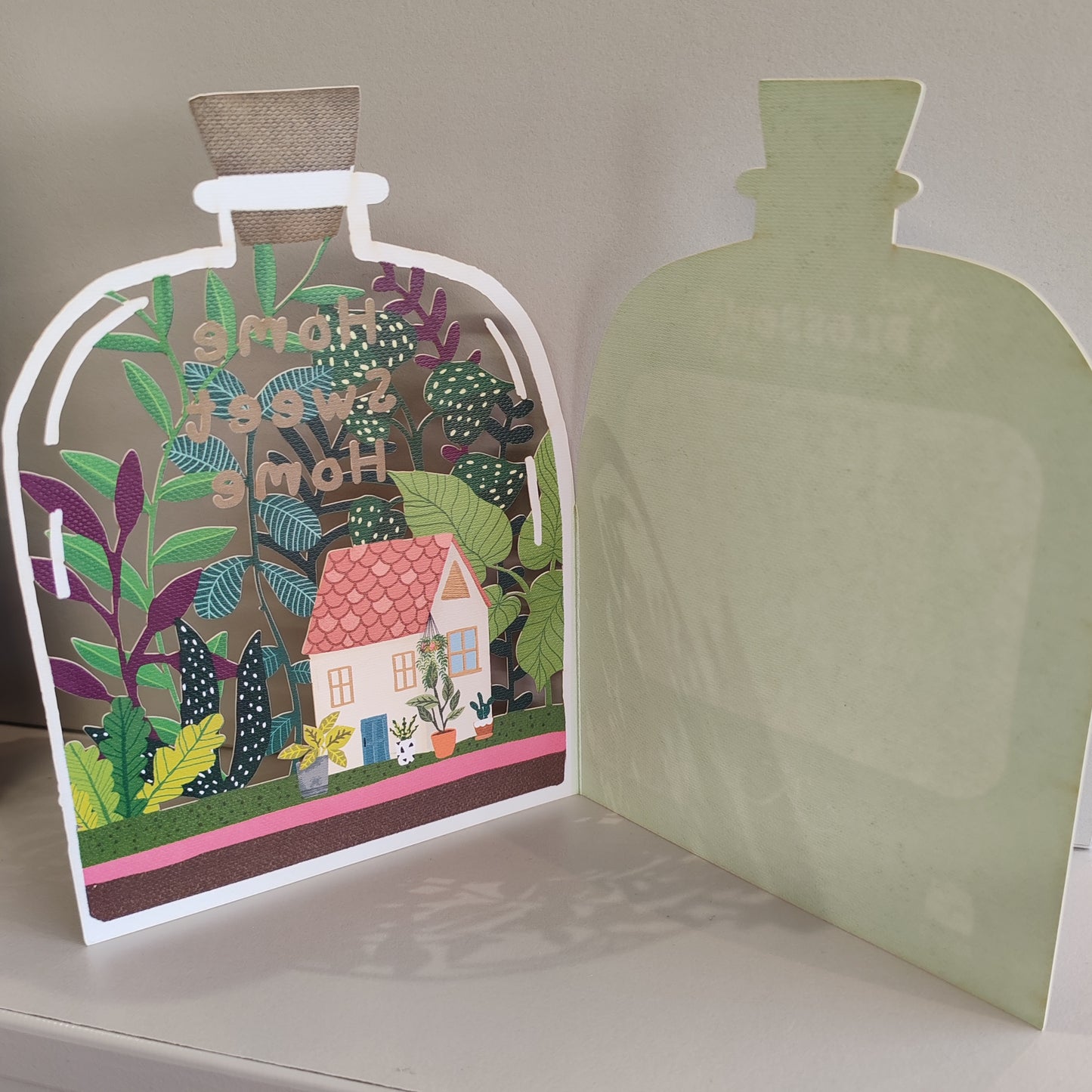 Home Sweet Home cut out bottle greeting card.