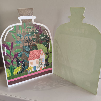 Home Sweet Home cut out bottle greeting card.