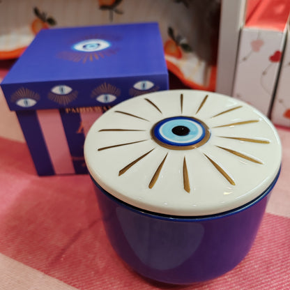 Evil eye scented candle in ceramic and glass repurposable pot