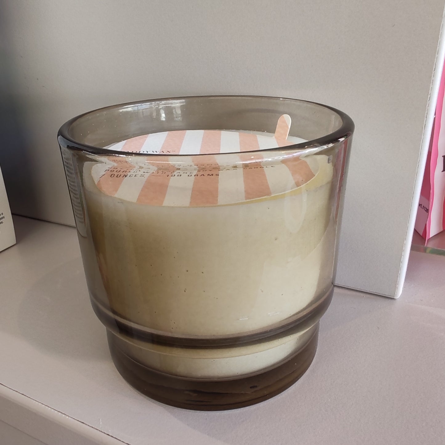Al Fresco Soy Wax scented candle. 7oz. Scent of Cotton & Teak in Taupe glass jar.