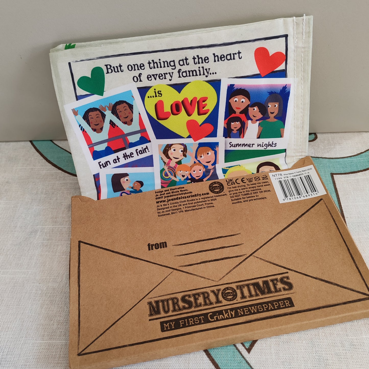 Crinkly sensory first cloth book - what makes a family