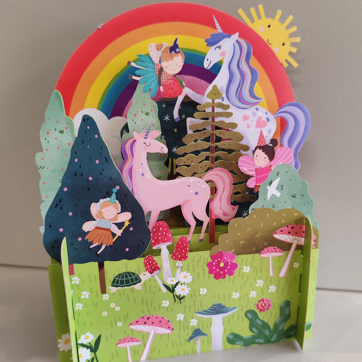 Miniature world 3d POP up greeting card. Unicorn and rainbow theme.