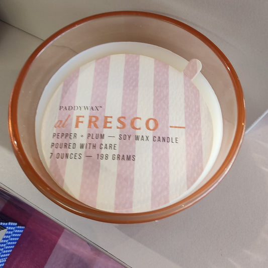 Al Fresco Soy Wax scented candle in peach glass jar. 7oz. Scent of Pepper and Plum