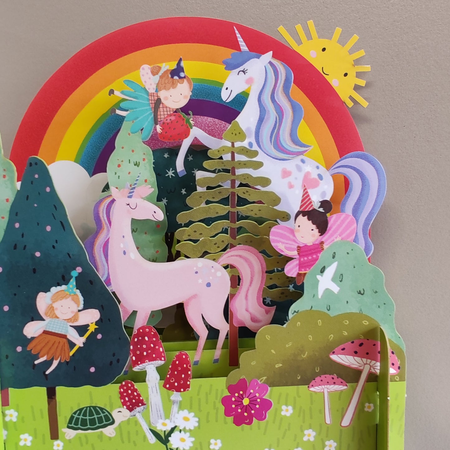 Miniature world 3d POP up greeting card. Unicorn and rainbow theme.