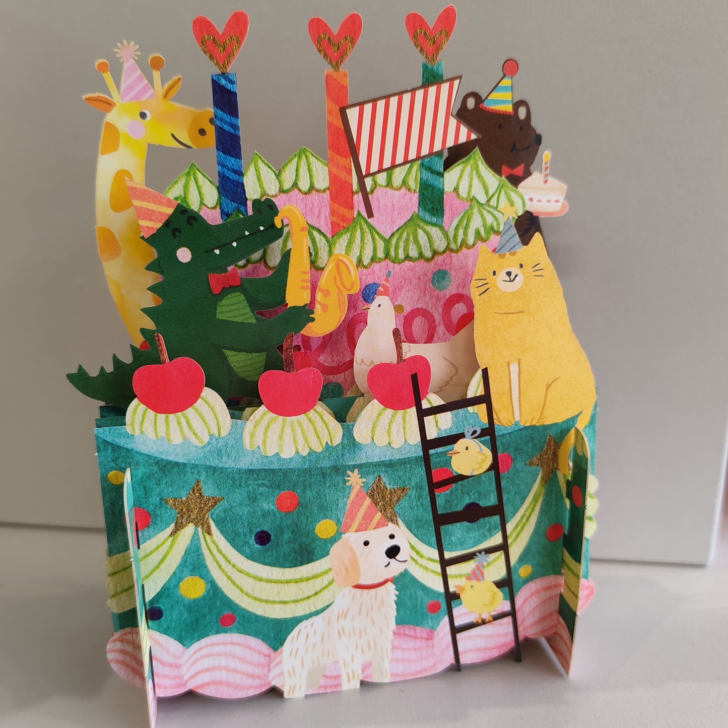 Miniature world 3d POP up greeting card. Animal birthday cake theme