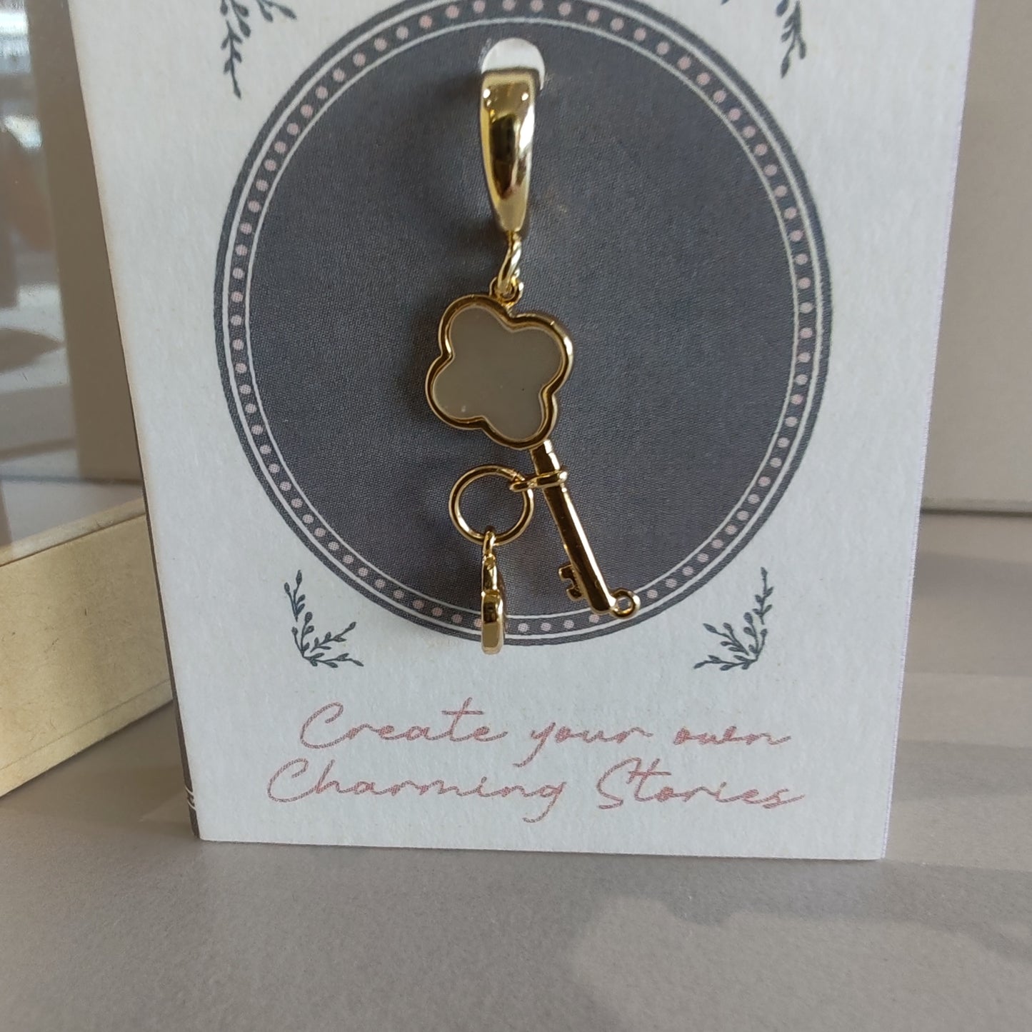 14k gold plated Mother of Pearl key lock clip on charm