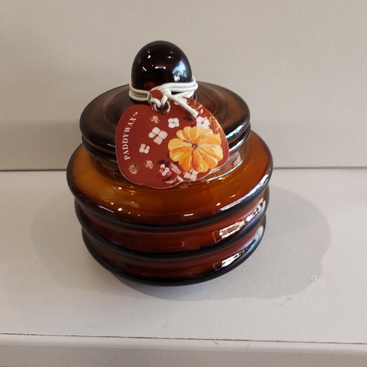 Pumpkin spice mini glass jar candle.