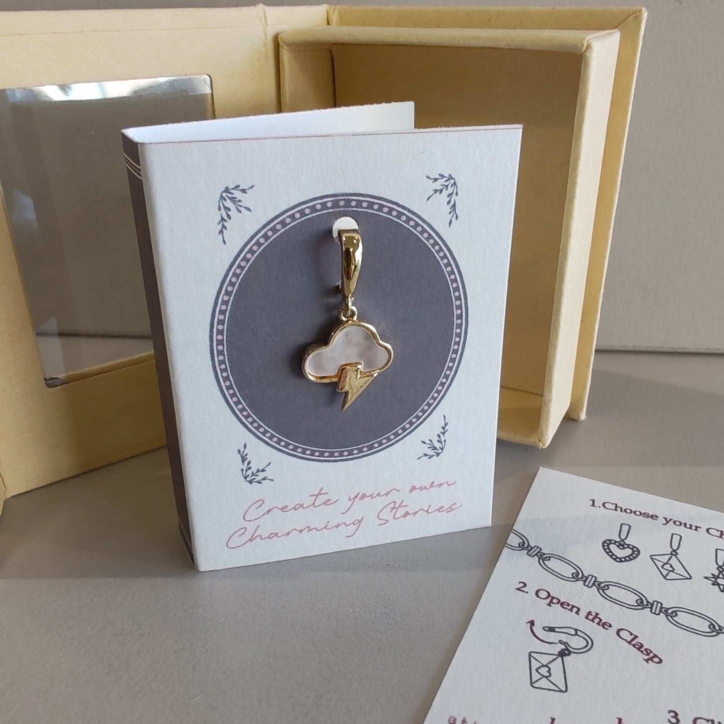 14k Mother of Pearl cloud lightning clip on charm.