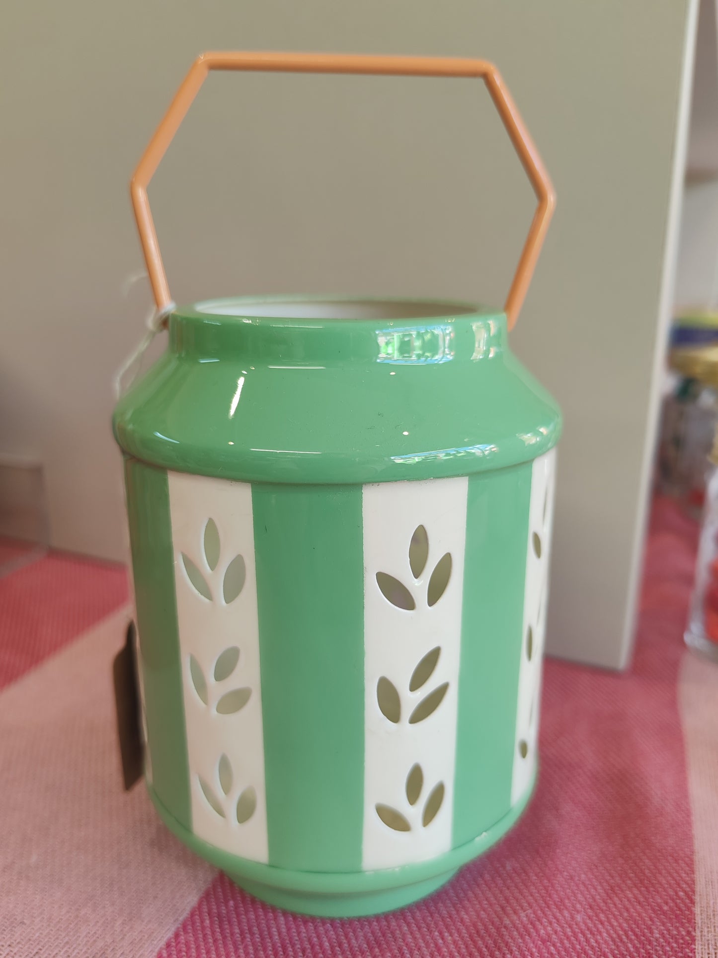 Small green and white enamel lantern