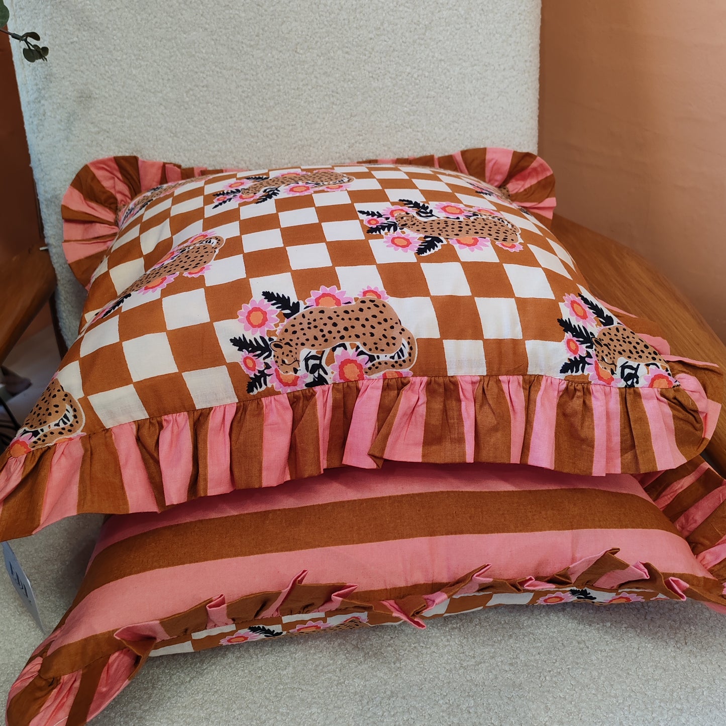 Leopard floral bronze / cream cushion with pink / bronze striped frill trim