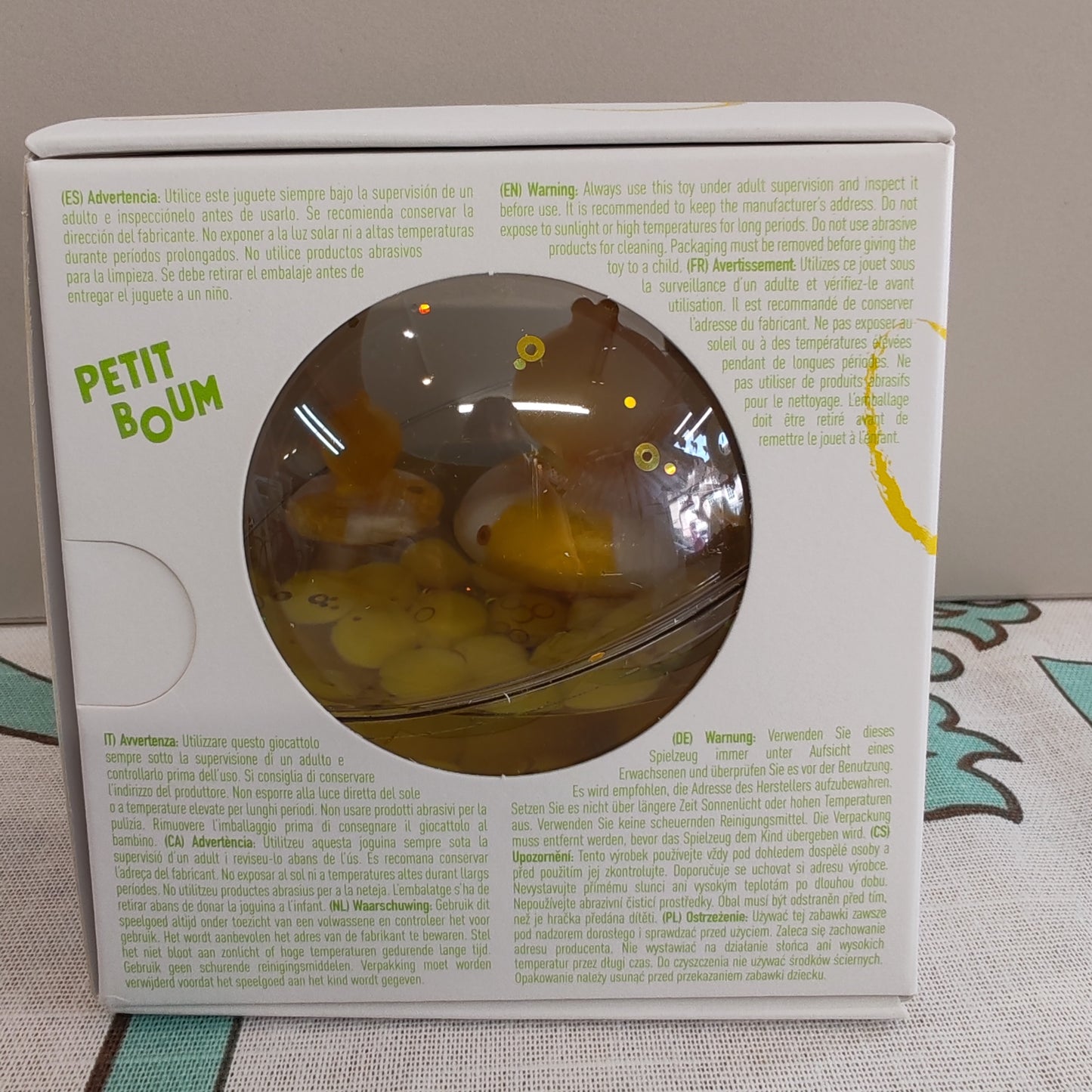 Sensory ball with ducks inside - yellow