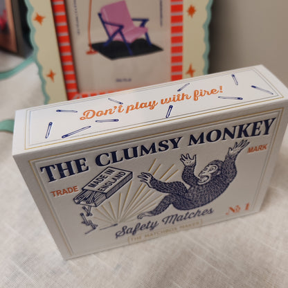 The clumsy monkey matches in decorative box.