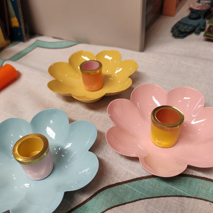 Enamel metal flower candle holder.
