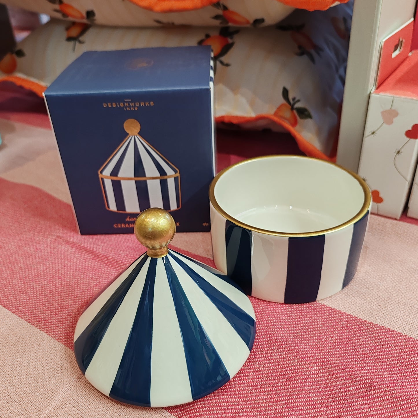Blue and white stripe ceramic trinket pot.