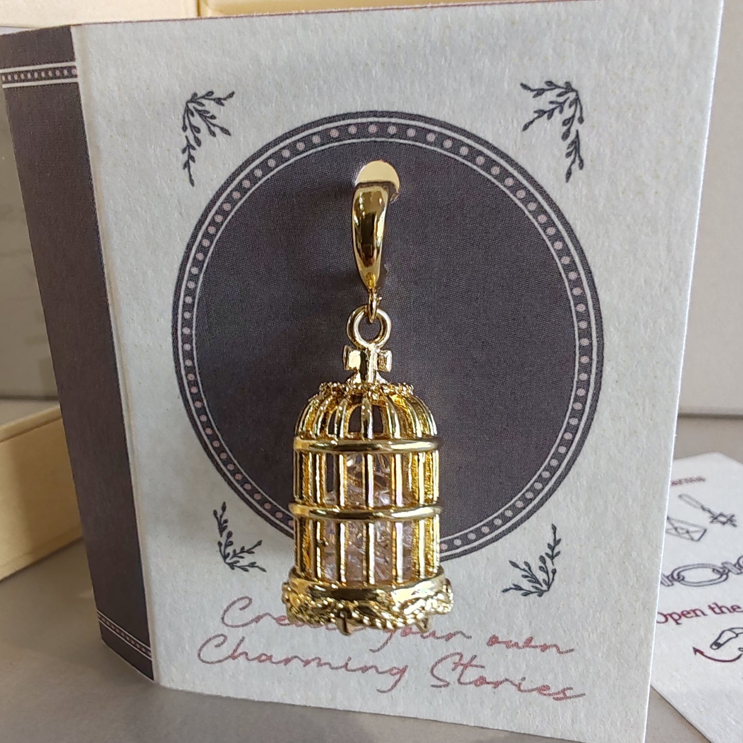 14k gold Birdcage with crystal charm