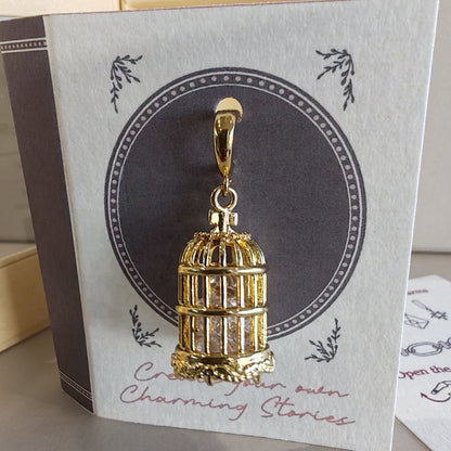 14k gold Birdcage with crystal charm