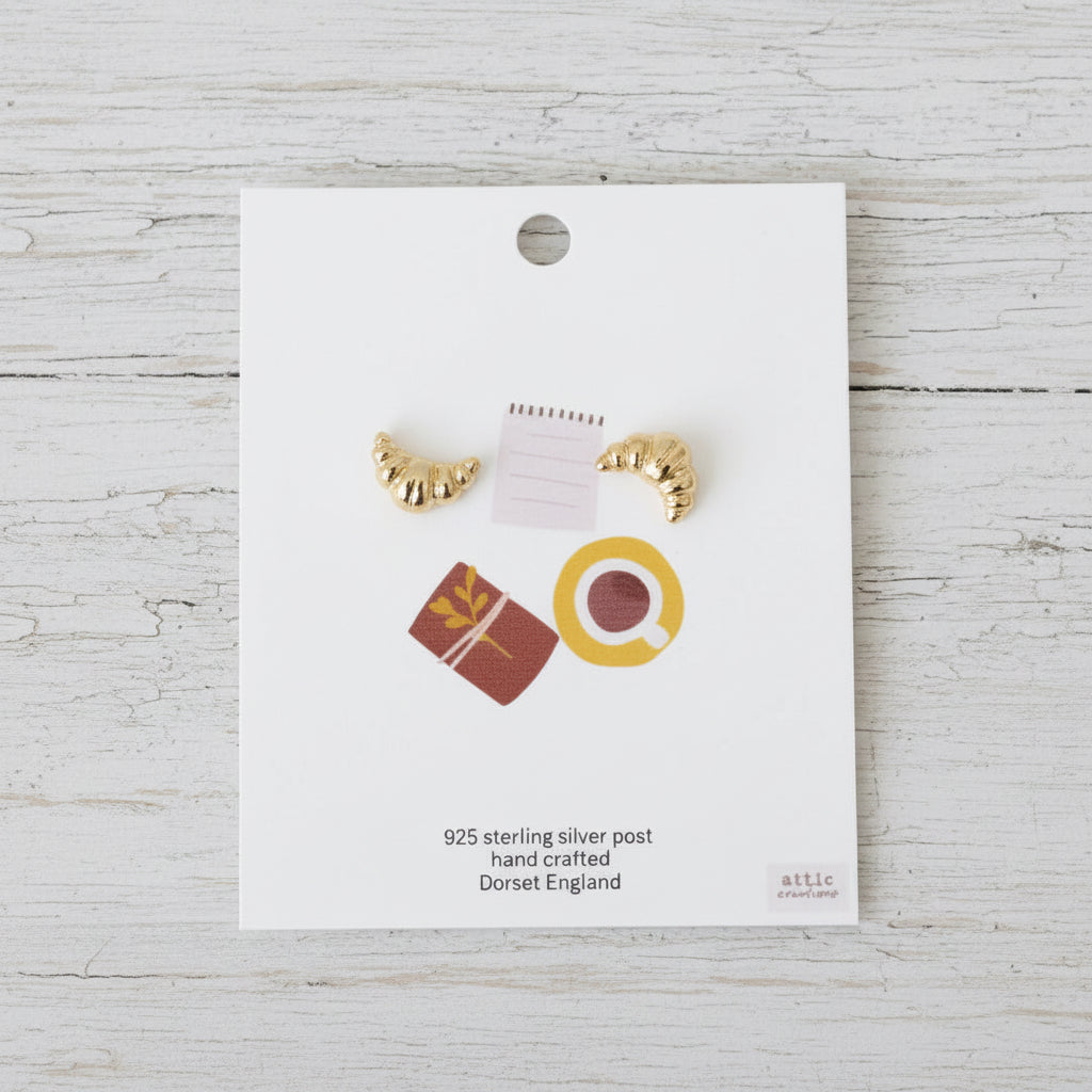 Gold croissant earrings
