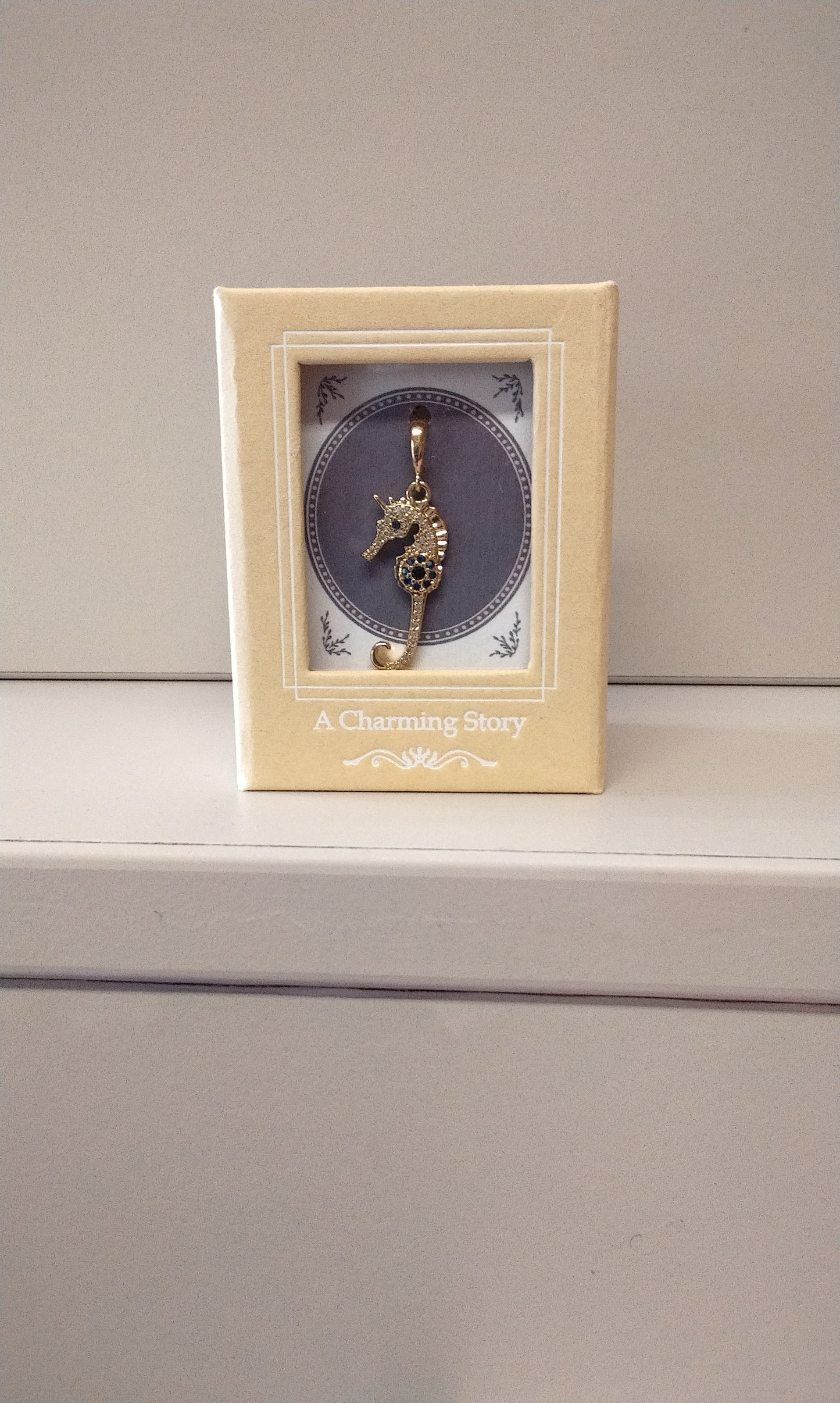 Seahorse Charm with blue gems