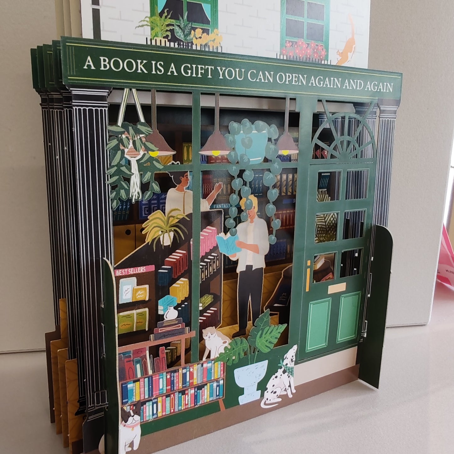 Miniature world Greeting card. 3d Pop up Bookshop