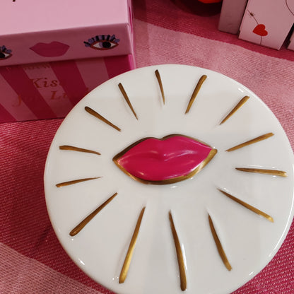 Kiss for luck candle in ceramic and glass repurposable pot.