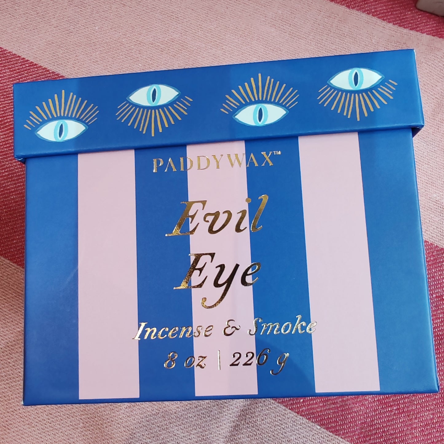 Evil eye scented candle in ceramic and glass repurposable pot