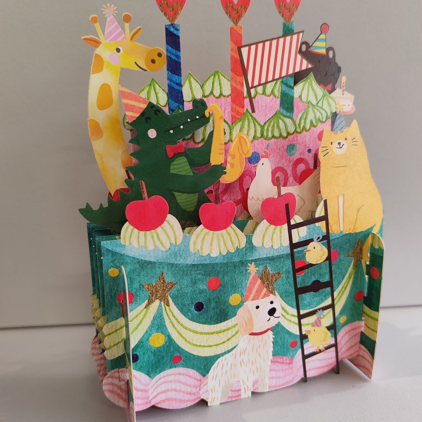 Miniature world 3d POP up greeting card. Animal birthday cake theme