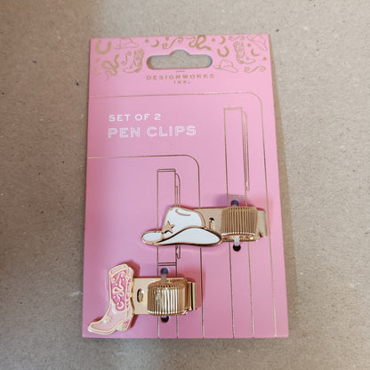 Cowboy hat and boot pen clips.