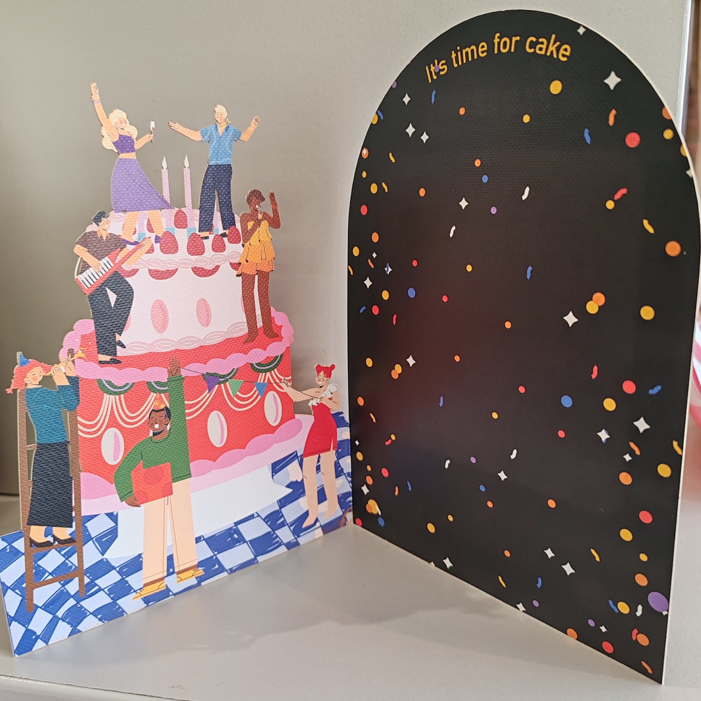 Party on a Birthday cake greeting card.