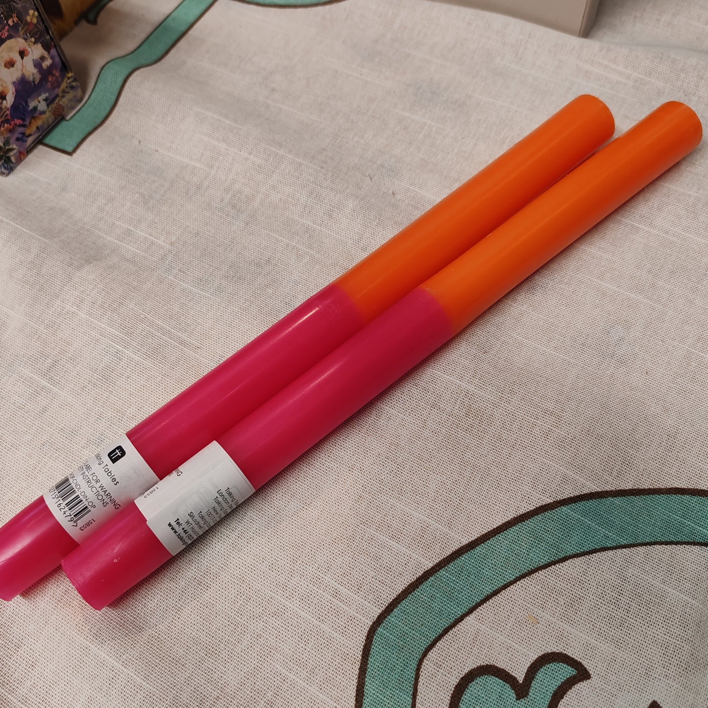 Pink and orange wax candle