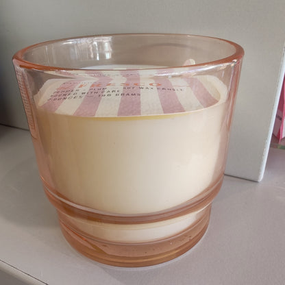 Al Fresco Soy Wax scented candle in peach glass jar. 7oz. Scent of Pepper and Plum