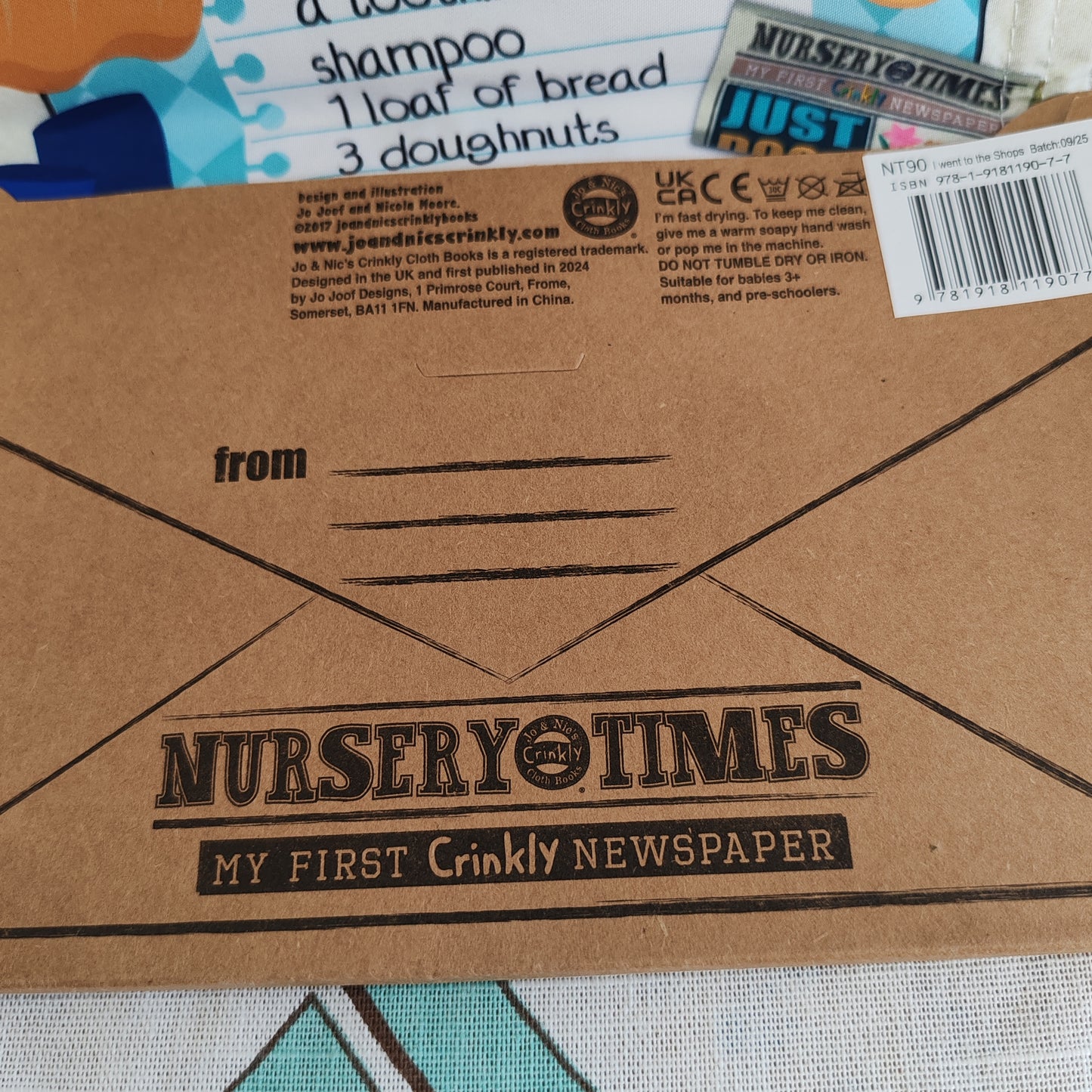Crinkly sensory first cloth book - I went to the shops.