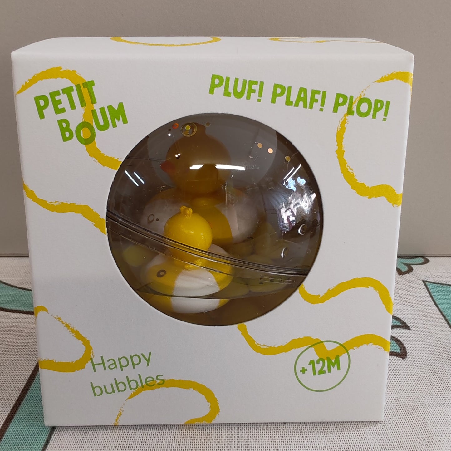 Sensory ball with ducks inside - yellow