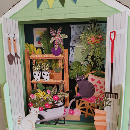 Miniature world Greeting card. Pop up Garden shed Theme