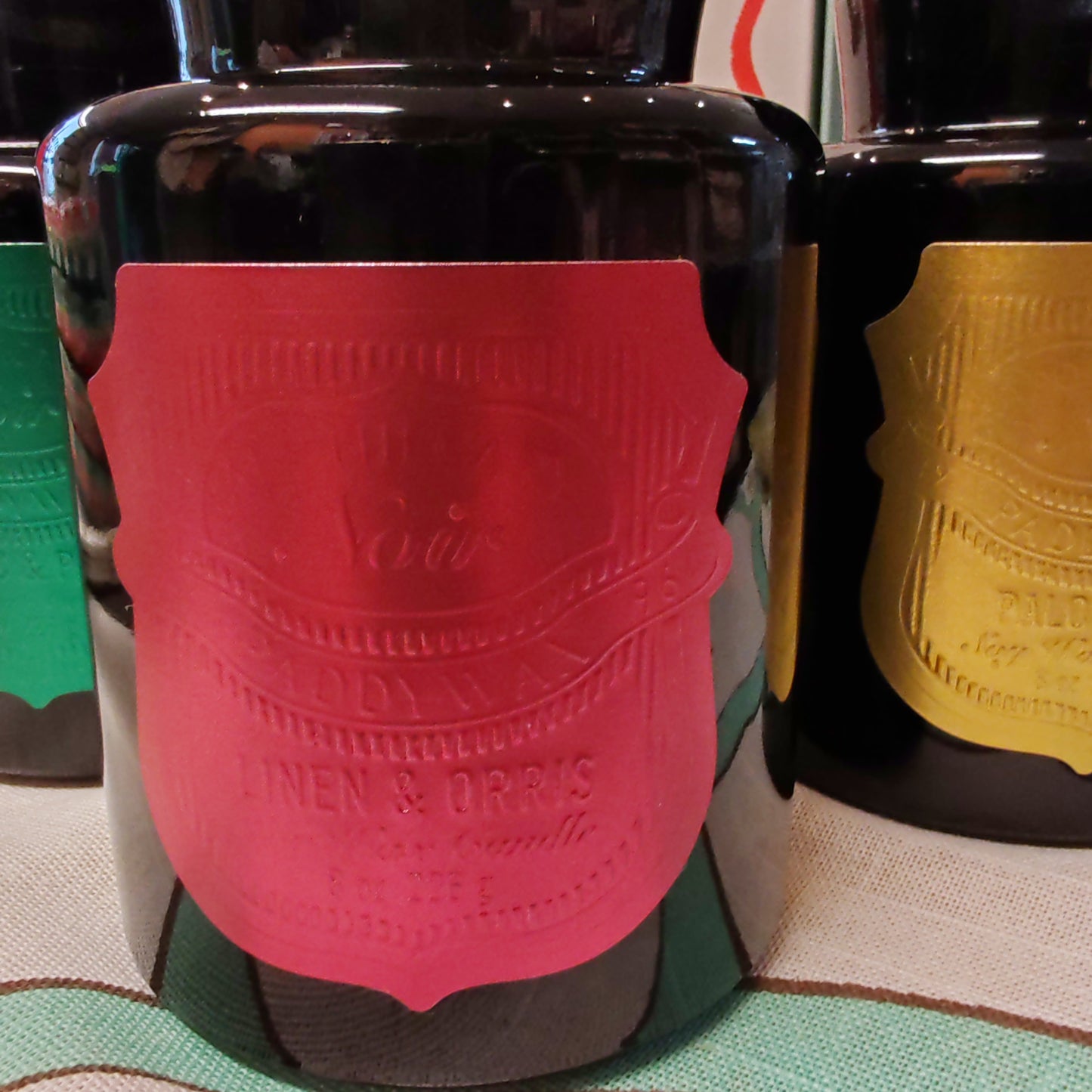Black Apothecary Jar Rich rose label. Scent of Linen and Orris